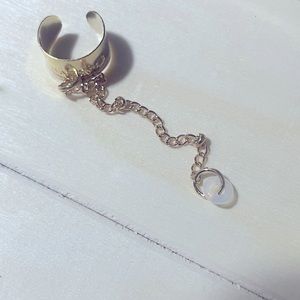 Gold ear cuff ear bud holder